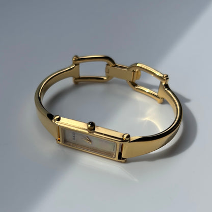 Gucci 1990s Seashell Dial Gold Plated Bangle Watch