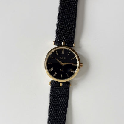 Gucci 1980s Round Black Dial Gold-Plated Watch (Large)