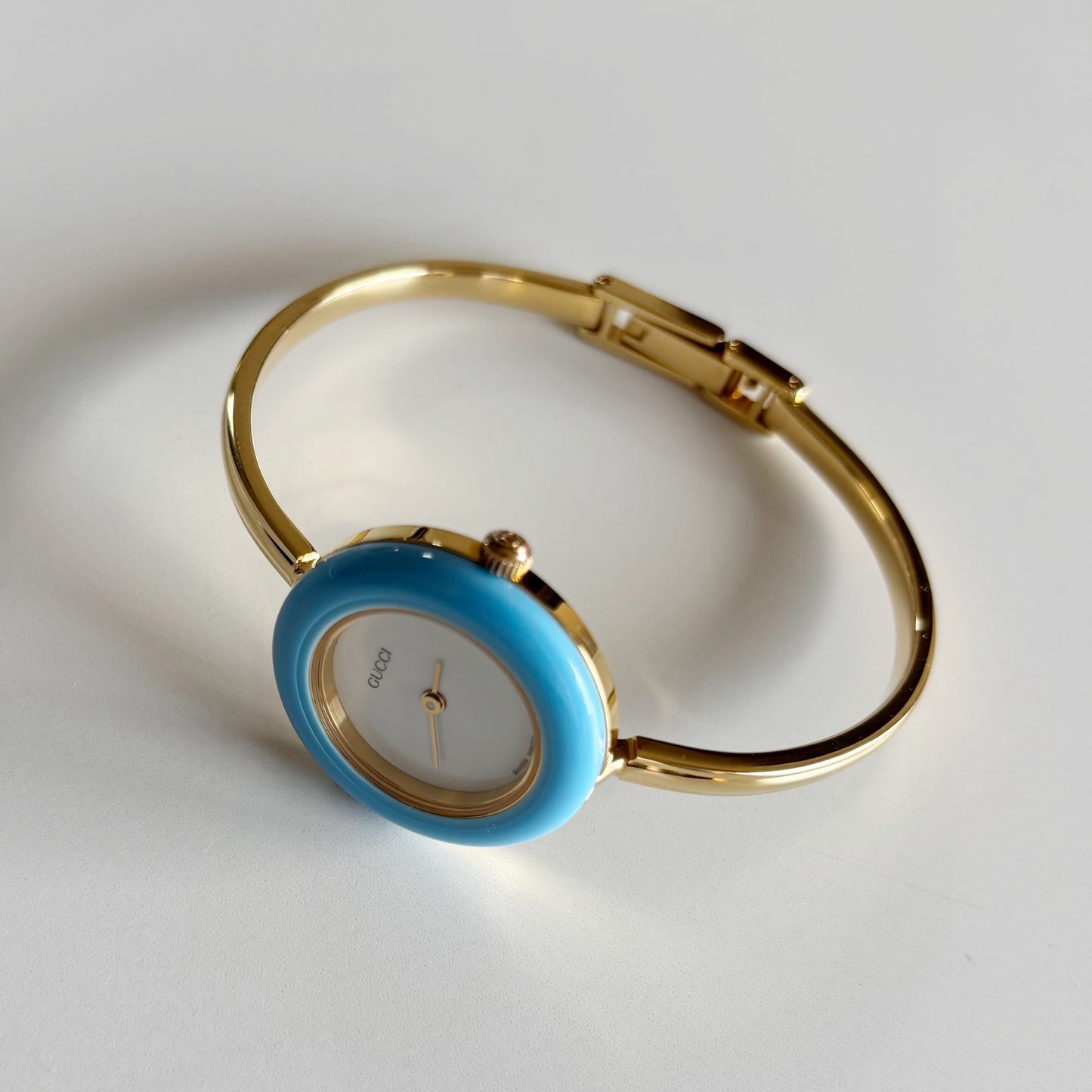 Gucci 1990s Interchangeable Bezel Gold Plated Bangle Watch with 12 bezels, case
