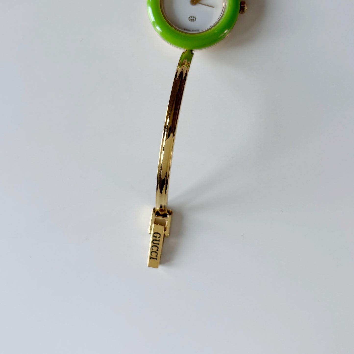 Gucci 1990s Interchangeable Bezel Gold Plated Bangle Watch with 12 bezels, case