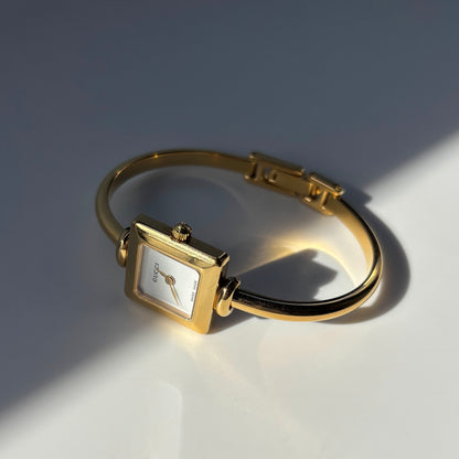 Gucci 1990s Square Dial Gold Plated Bangle Watch