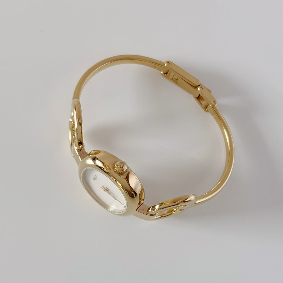 Gucci 1990s Seashell Oval Dial Gold-Plated Bangle Watch (Small)
