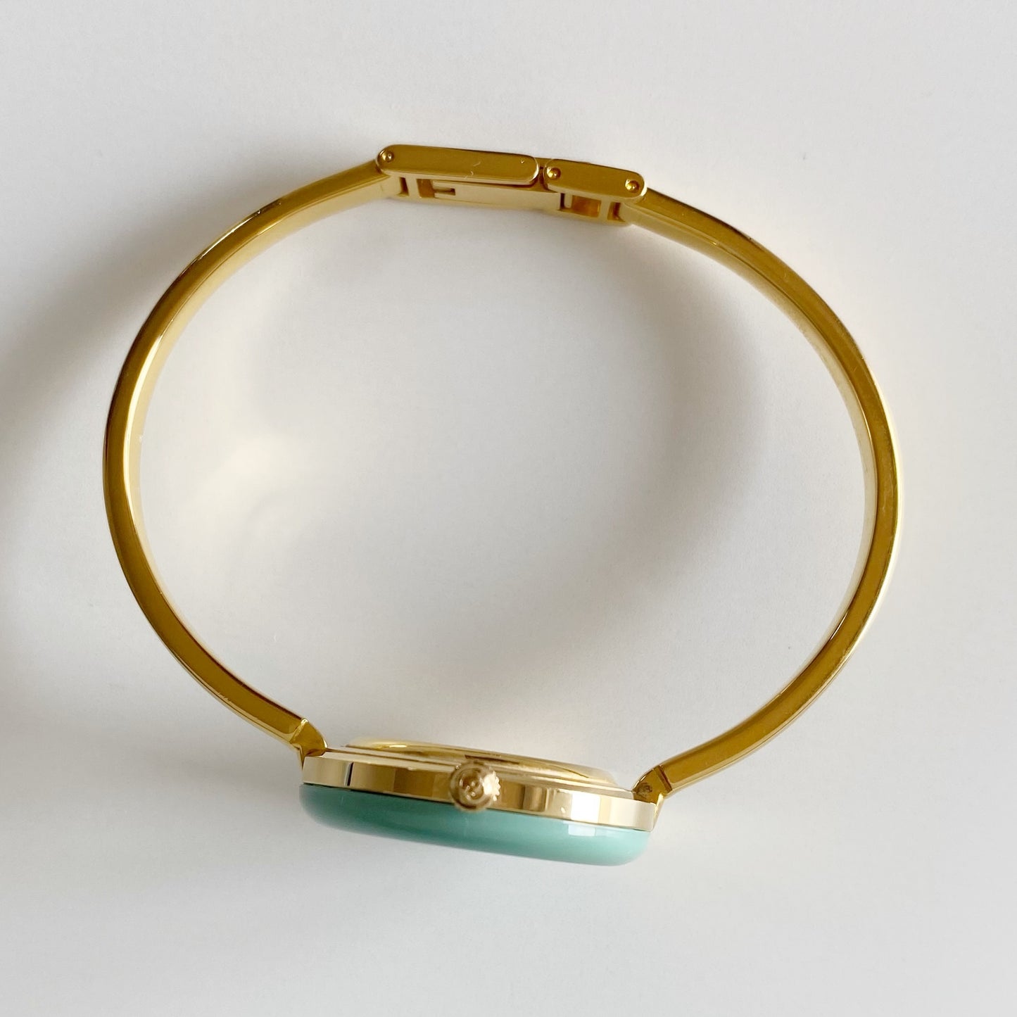 Gucci 1990s Interchangeable Bezel Gold Plated Bangle Watch with 12 bezels, case