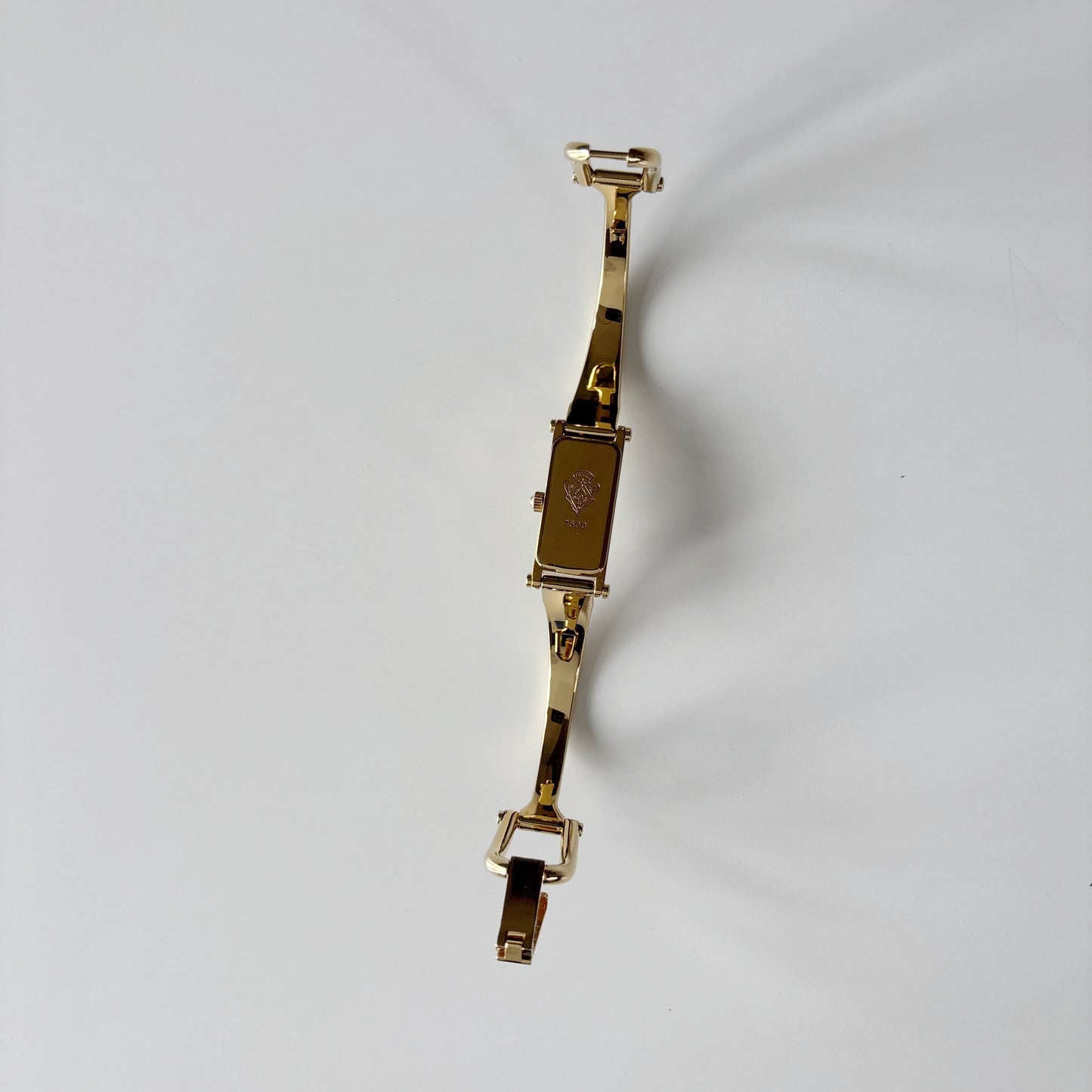 Gucci 1990s Gold Rectangular Dial Gold Plated Bangle Watch