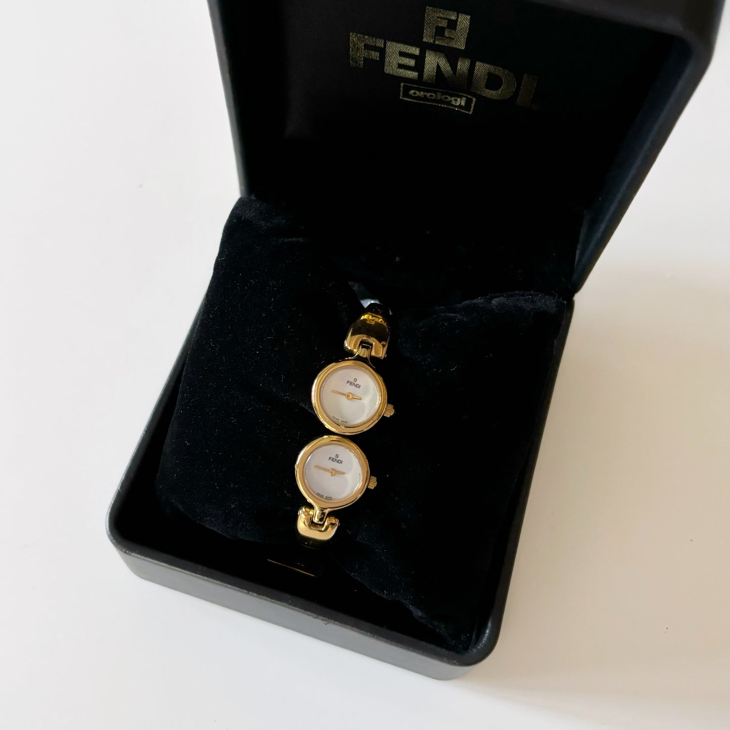 Fendi 1990s Seashell Dial Two Time Zone Gold Plated Bangle Watch