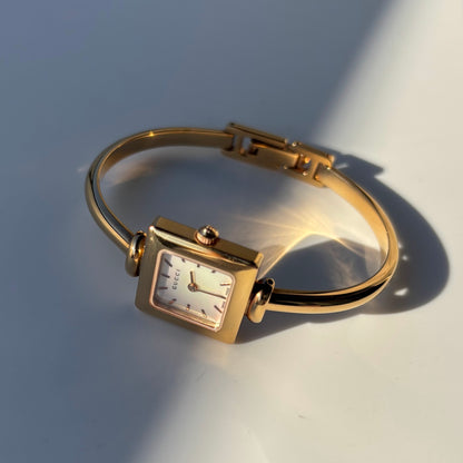 Gucci 1990s Seashell Square Dial Gold Plated Bangle Watch