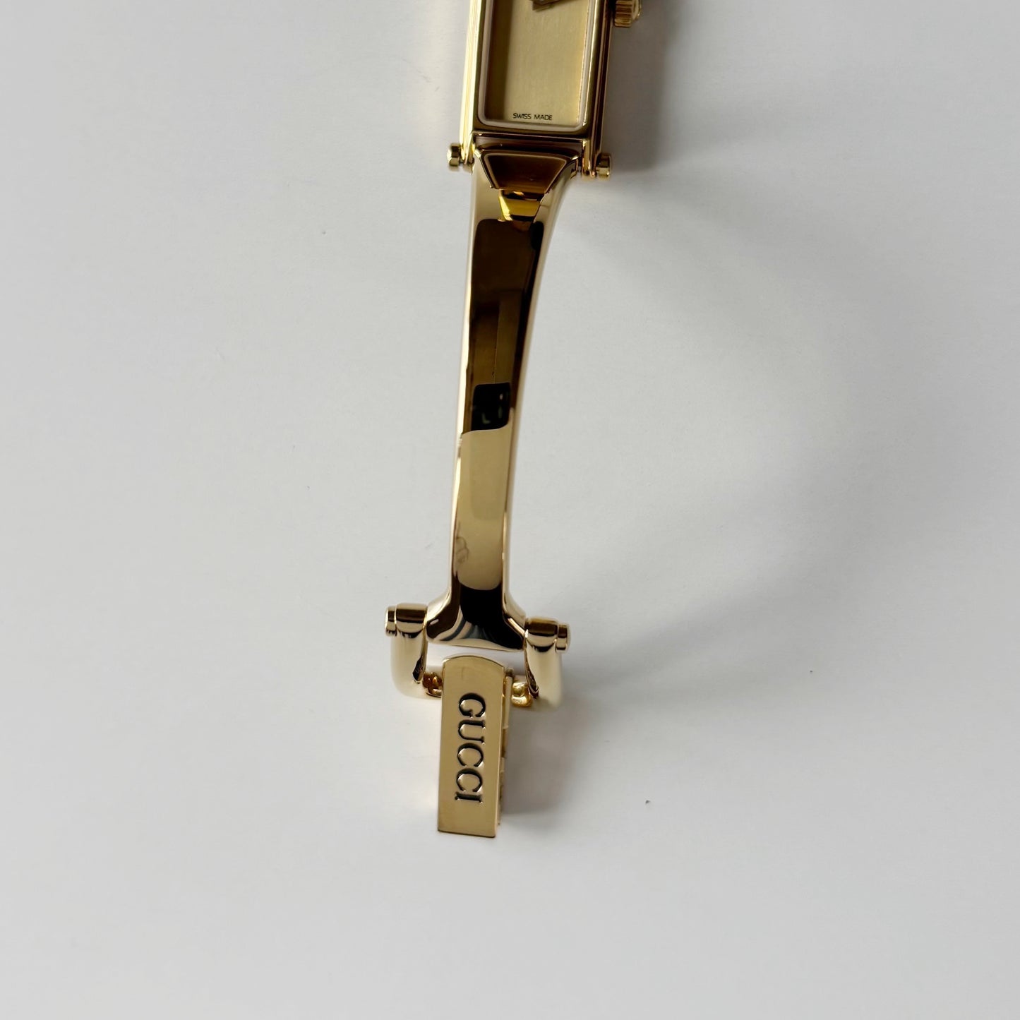 Gucci 1990s Gold Rectangular Dial Gold Plated Bangle Watch
