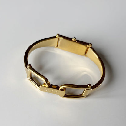 Gucci 1990s Gold Rectangular Dial Gold Plated Bangle Watch