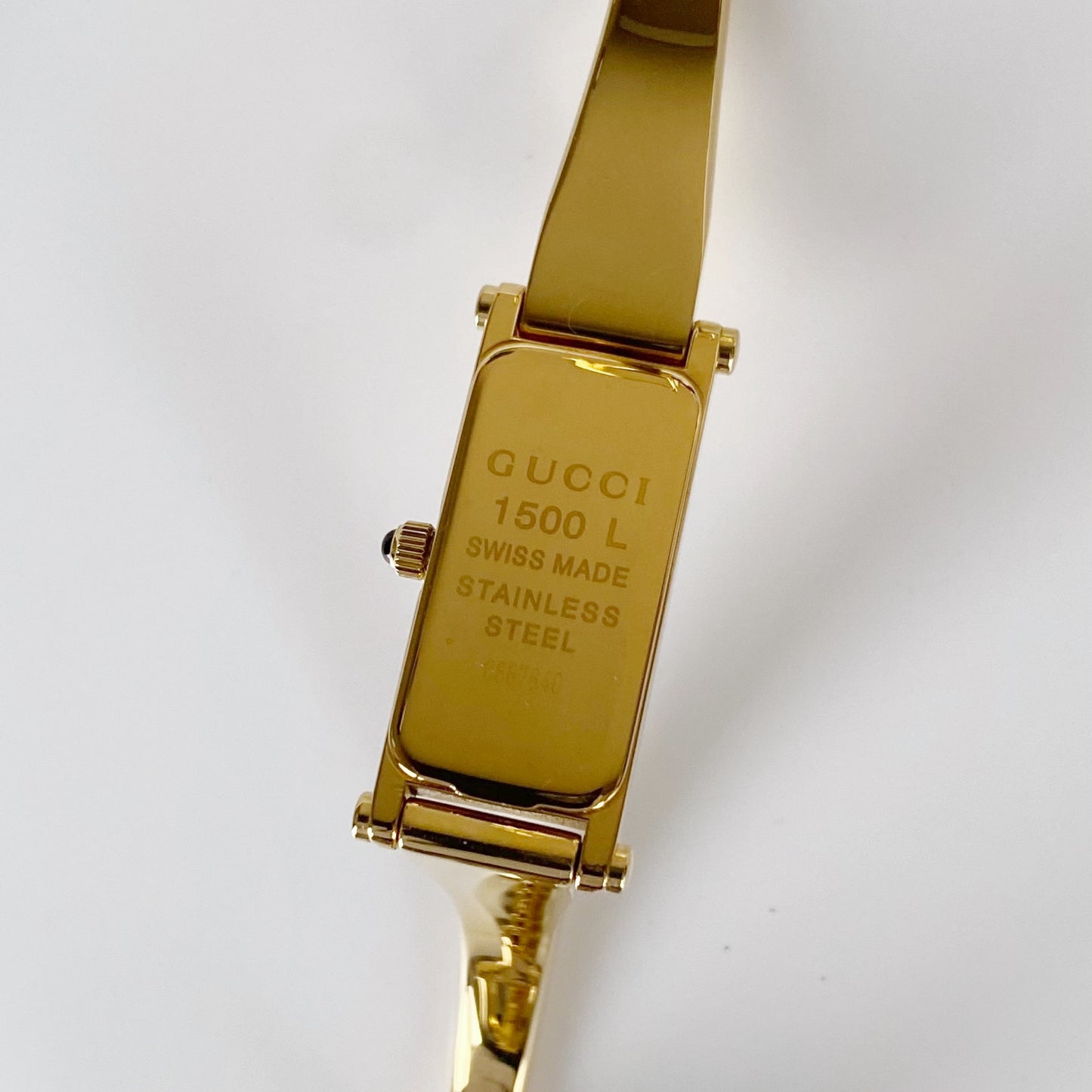 Gucci 1990s Black Dial Rectangular Gold Plated Bangle Watch