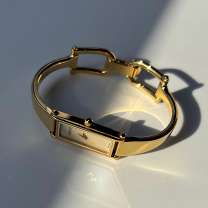 Gucci 1990s Seashell Dial Rectangular Gold Plated Bangle Watch