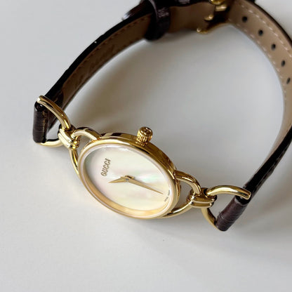 Gucci 1990s Seashell Dial Horsebit Gold Plated Watch