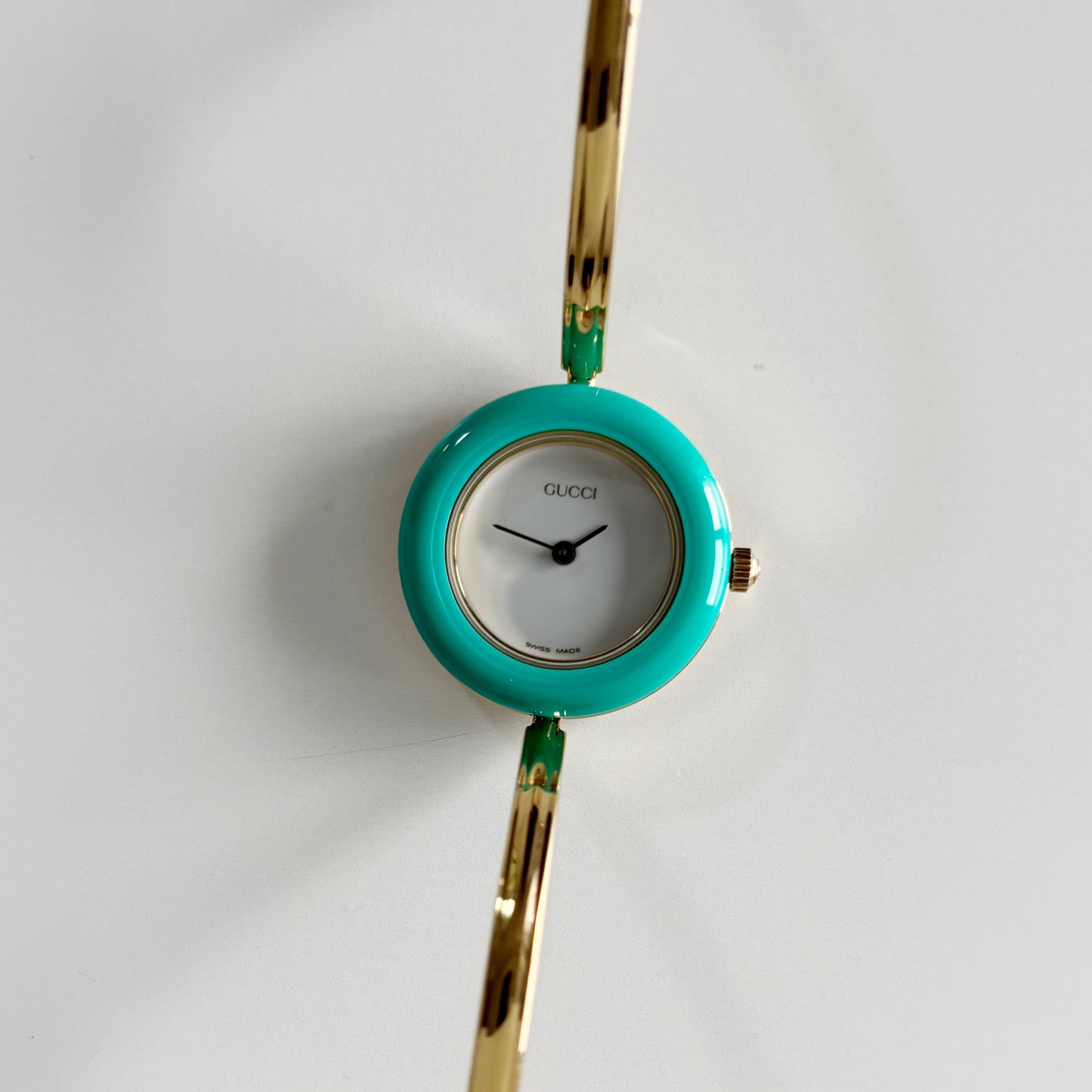 Gucci 1990s Interchangeable Bezel Gold Plated Bangle Watch with 12 bezels, case