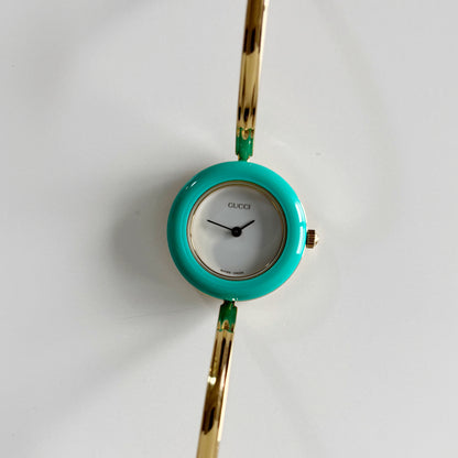 Gucci 1990s Interchangeable Bezel Gold Plated Bangle Watch with 12 bezels, case
