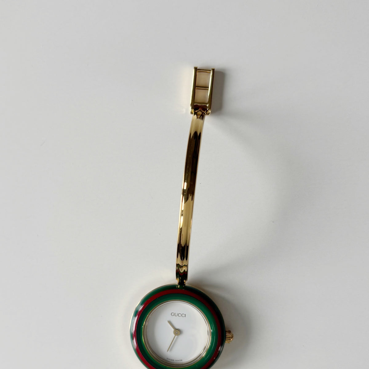 Gucci 1990s Interchangeable Bezel Gold Plated Bangle Watch with 12 bezels, case