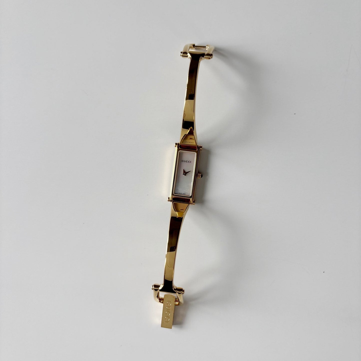 Gucci 1990s Seashell Rectangular Dial Gold Plated Bangle Watch