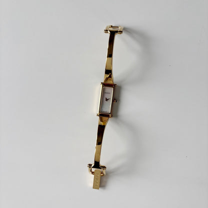 Gucci 1990s Seashell Rectangular Dial Gold Plated Bangle Watch