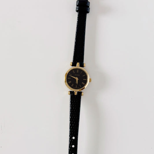 Gucci 1990s Black Round Dial Sherry Gold-Plated Watch