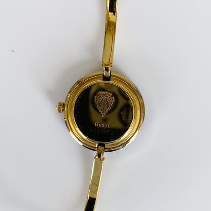 Gucci 1990s Interchangeable Bezel Gold Plated Bangle Watch with case, 12 bezels