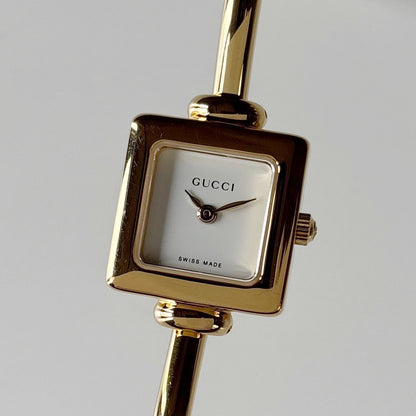 Gucci 1990s Square Dial Gold Plated Bangle Watch