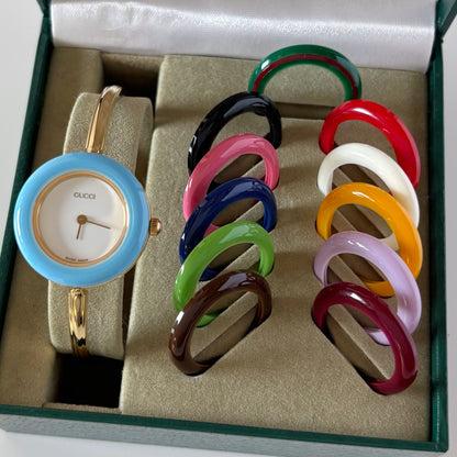 Gucci 1990s Interchangeable Bezel Gold Plated Bangle Watch with 12 bezels, case