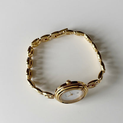 Gucci 1990s Interchangeable Bezel Gold Plated Rice Chain Watch with 6 bezels, case (165mm)