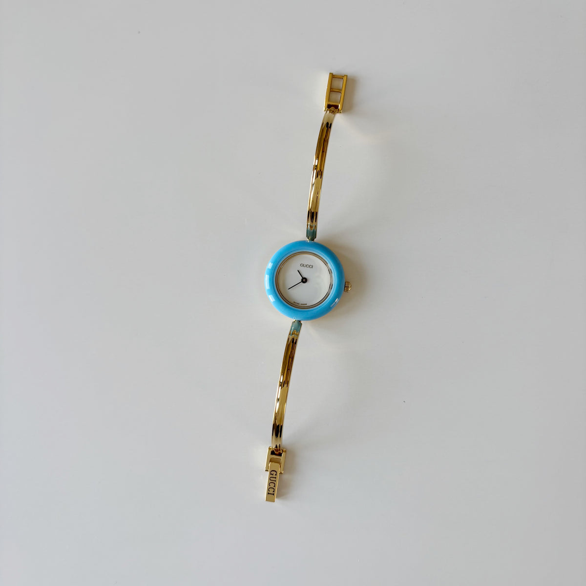 Gucci 1990s Interchangeable Bezel Gold Plated Bangle Watch with 12 bezels, case (Small)