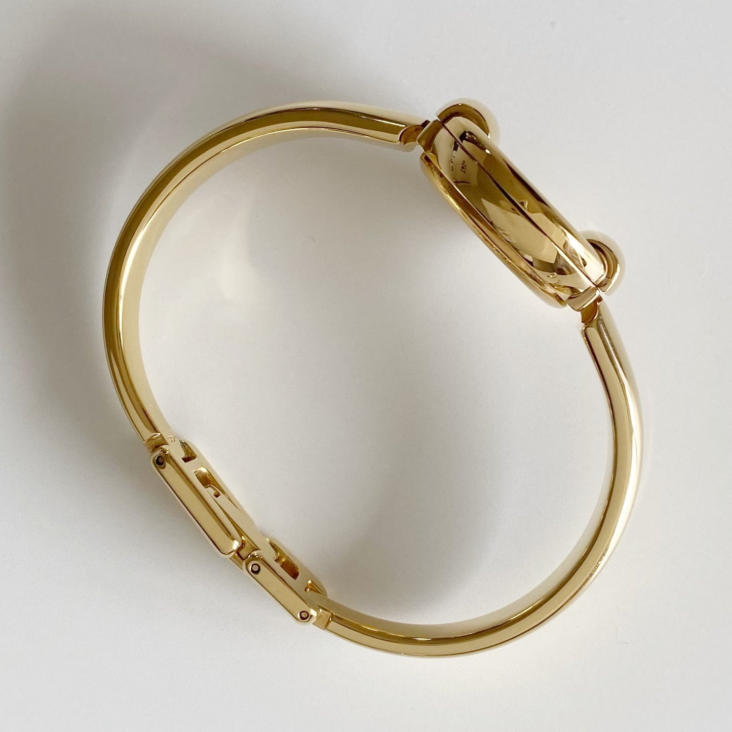 Gucci 1990s Round Dial Gold Plated Bangle Watch