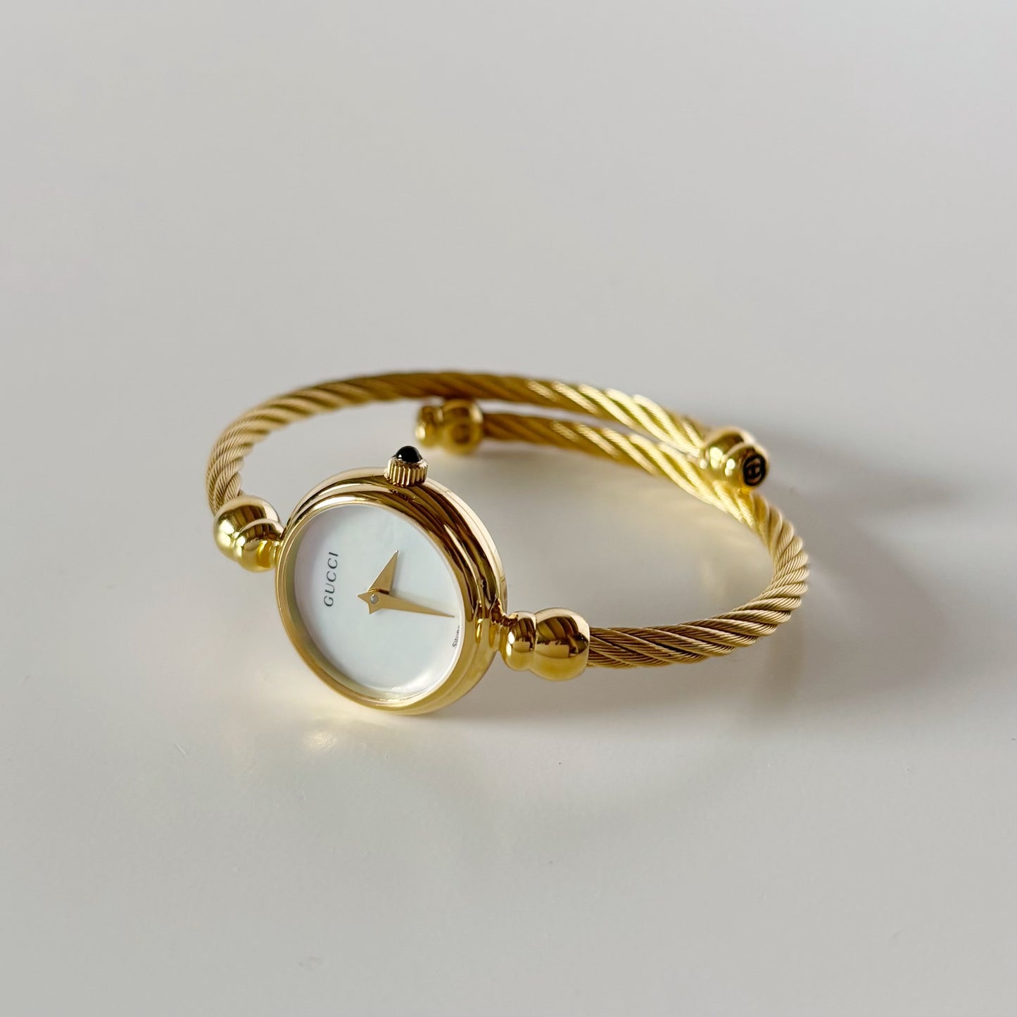 Gucci 1990s Seashell Dial Gold Plated Cable Bangle Watch