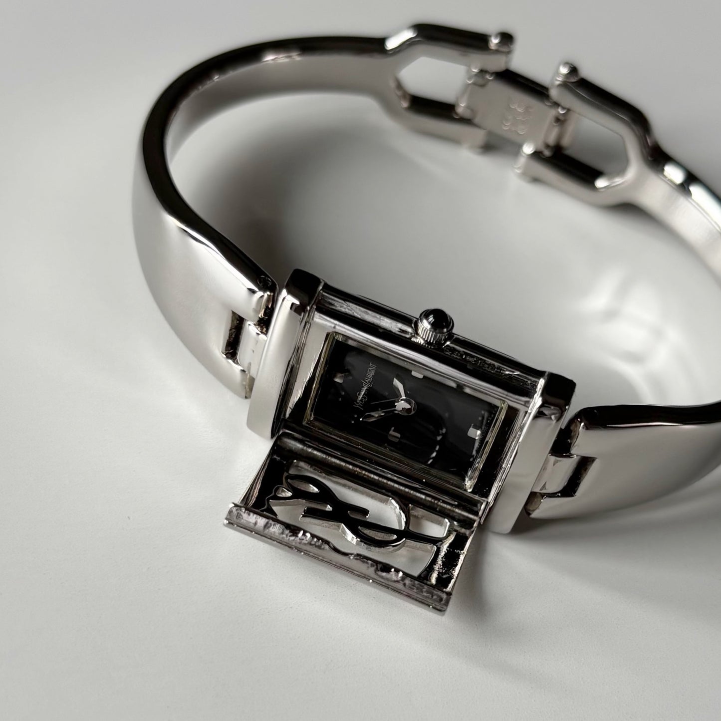 Yves Saint Laurent 1990s Black Dial Silver Bangle Watch