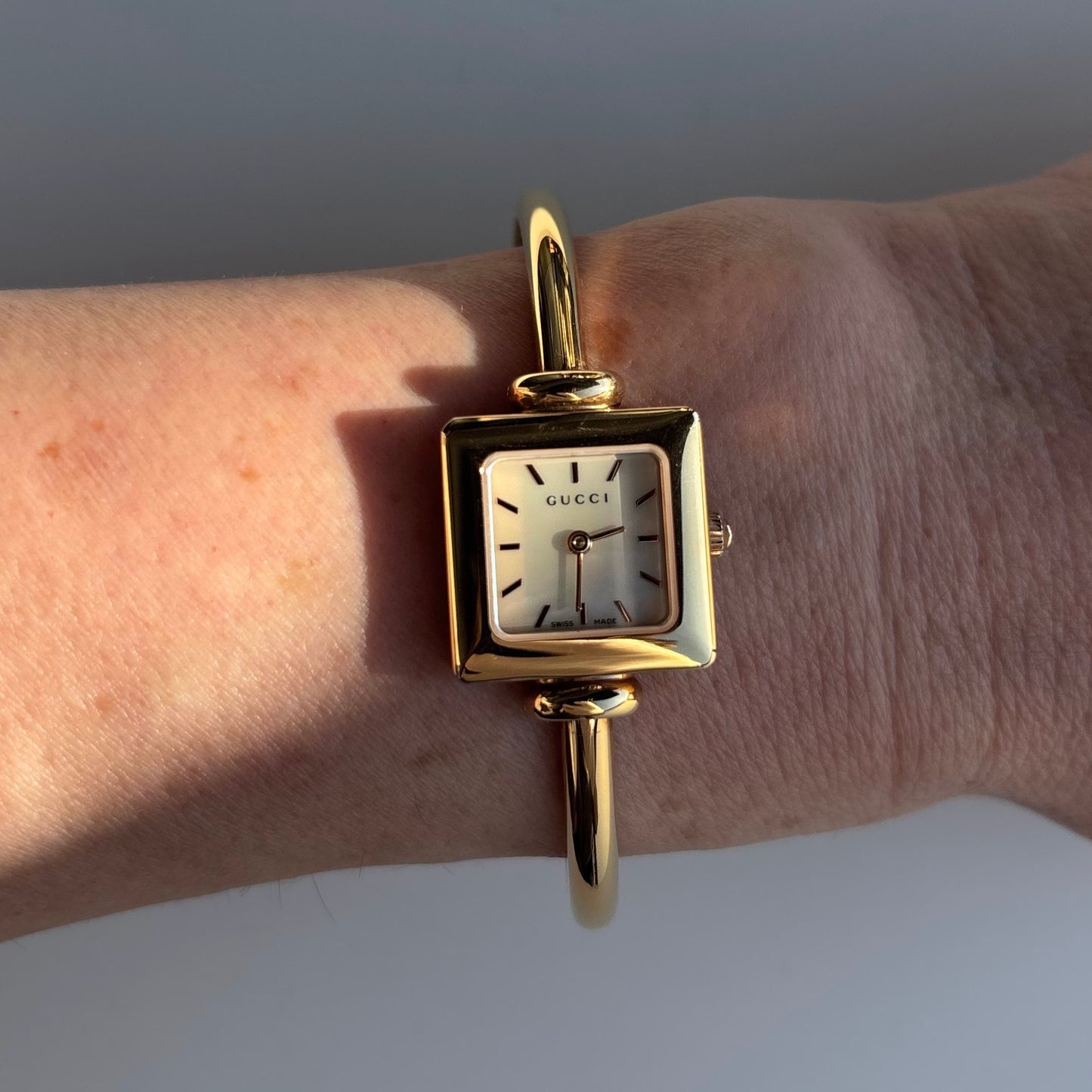 Gucci 1990s Seashell Square Dial Gold Plated Bangle Watch