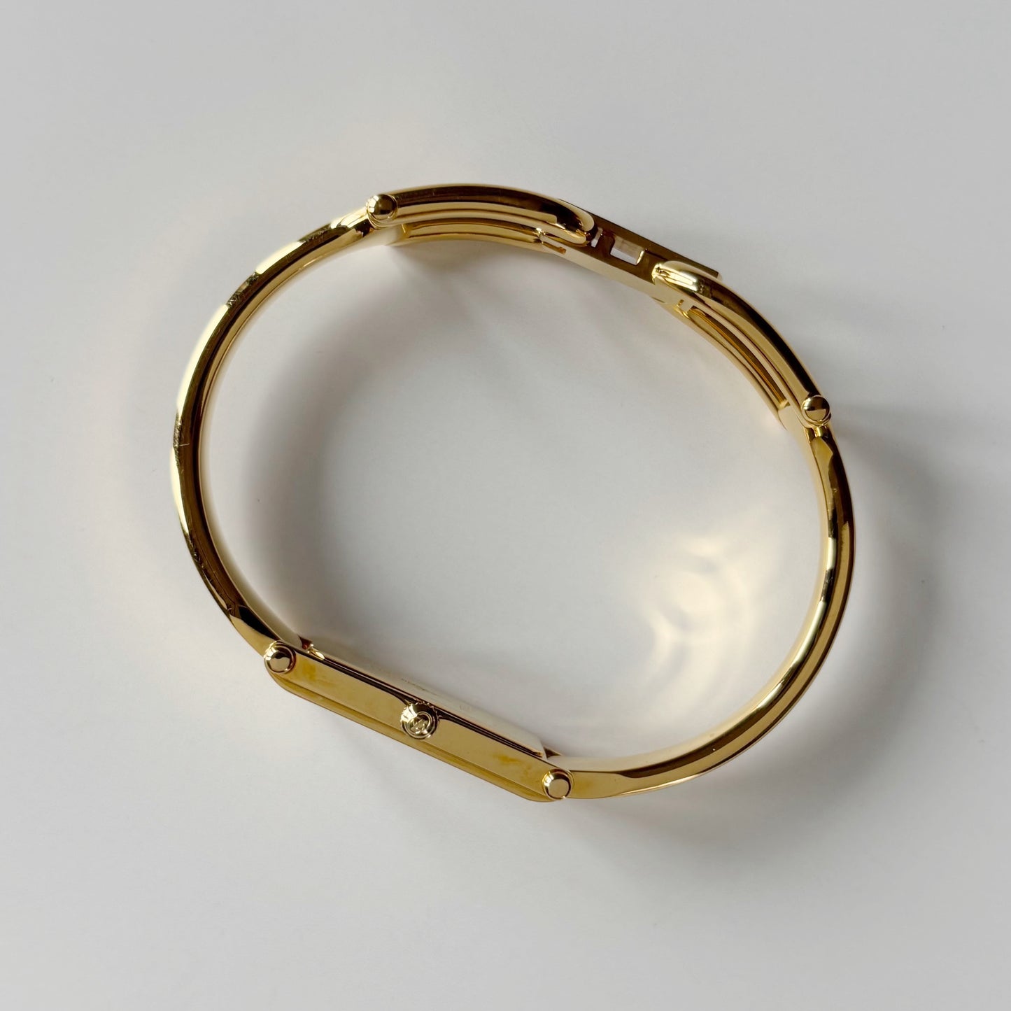 Gucci 1990s Seashell Rectangular Dial Gold Plated Bangle Watch