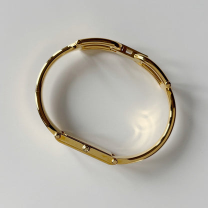 Gucci 1990s Seashell Rectangular Dial Gold Plated Bangle Watch