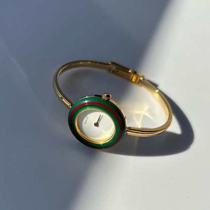 Gucci 1990s Interchangeable Bezel Gold Plated Bangle Watch with 12 bezels, case