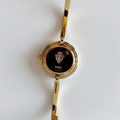 Gucci 1990s Interchangeable Bezel Gold Plated Bangle Watch with 12 bezels, case (Small)