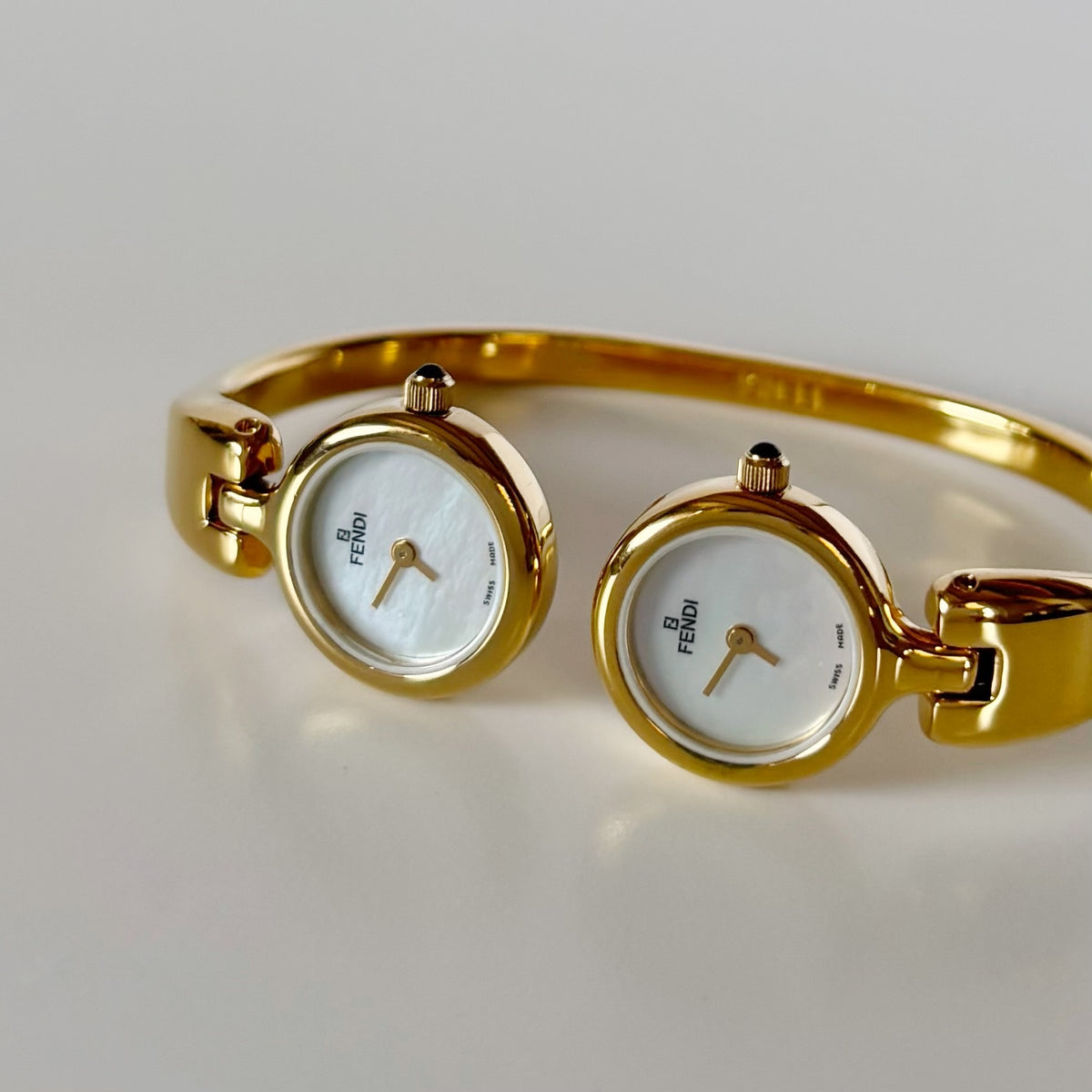 Fendi 1990s Seashell Dial Two Time Zone Gold Plated Bangle Watch