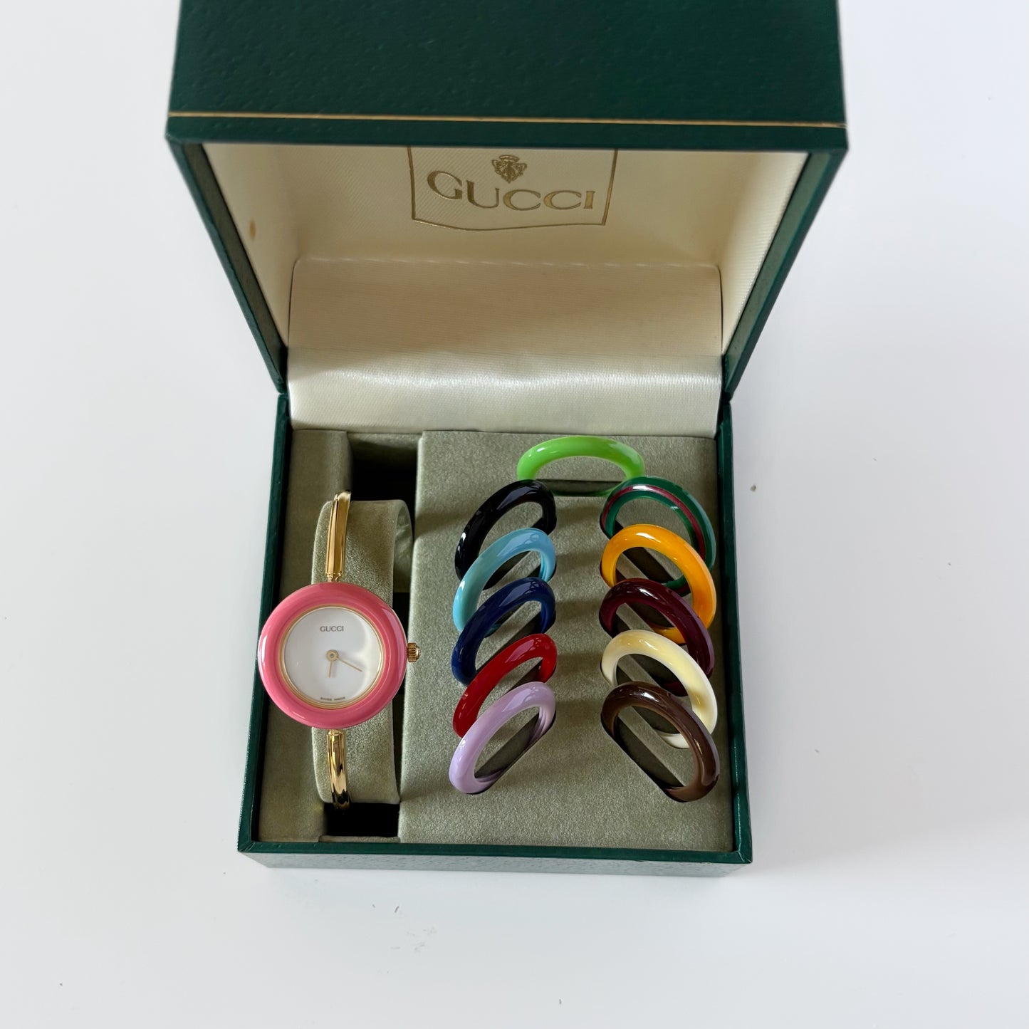 Gucci 1990s Interchangeable Bezel Gold Plated Bangle Watch with 12 bezels, case