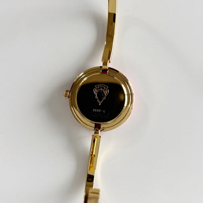 Gucci 1990s Interchangeable Bezel Gold Plated Bangle Watch with 12 bezels, case (Small)