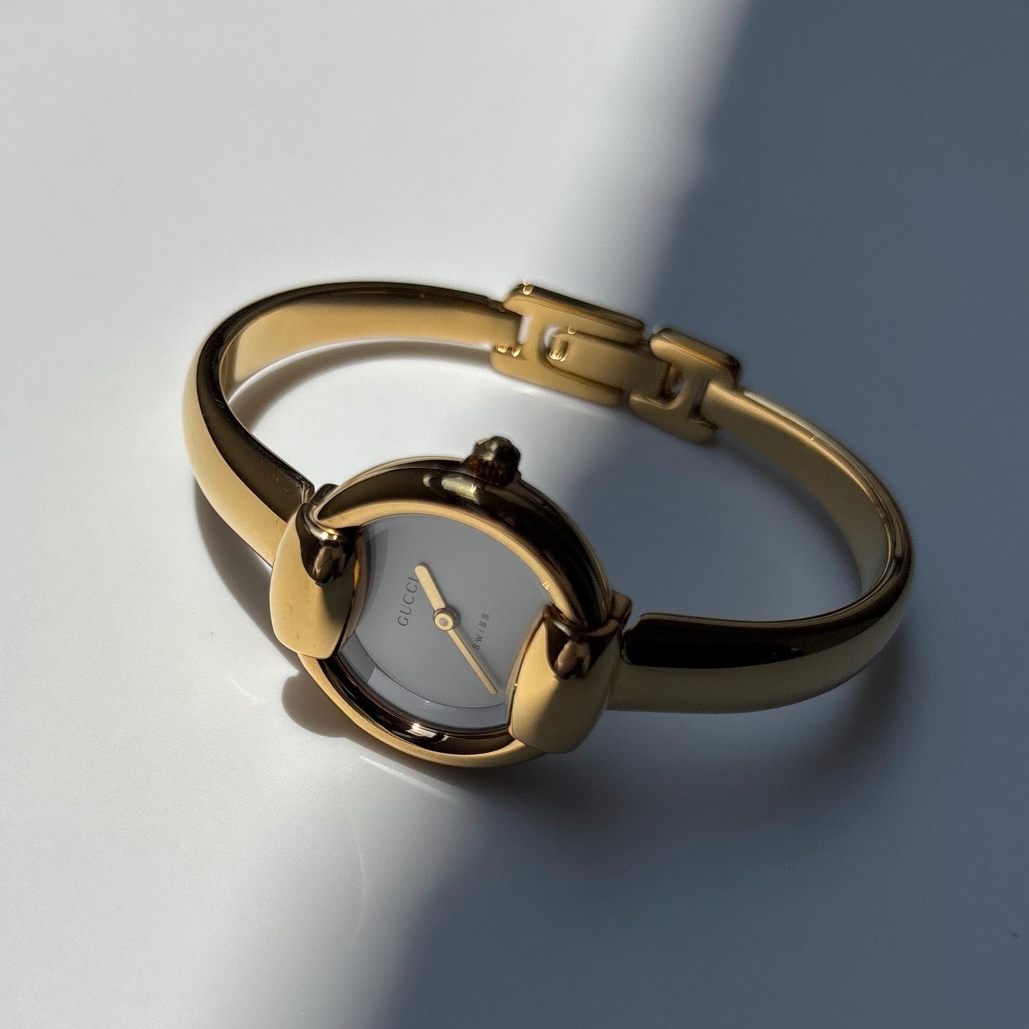 Gucci 1990s Round Dial Gold Plated Bangle Watch