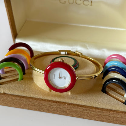 Gucci 1990s Interchangeable Bezel Gold Plated Bangle Watch with 12 bezels, case