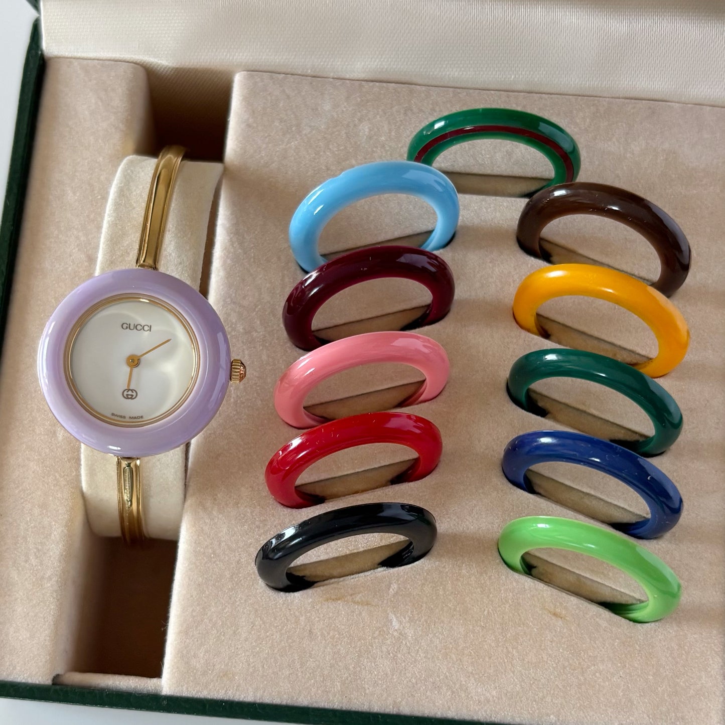 Gucci 1990s Interchangeable Bezel Gold Plated Bangle Watch with 12 bezels, case