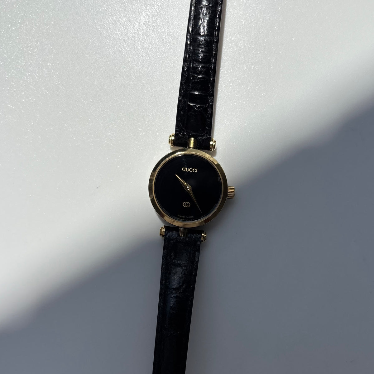 Gucci 1980s Black Dial Round Gold-Plated Watch