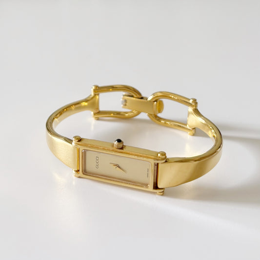 Gucci 1990s Gold Dial Gold Plated Bangle Watch