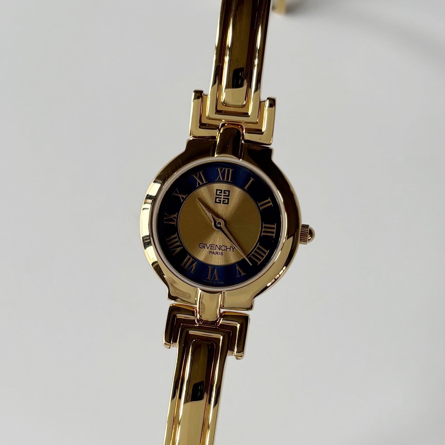 Givenchy 1990s Round Dial Gold Plated Bangle Watch