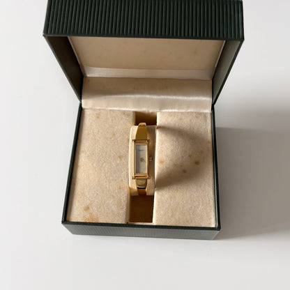 Gucci 1990s Seashell Dial Rectangular Gold Plated Bangle Watch