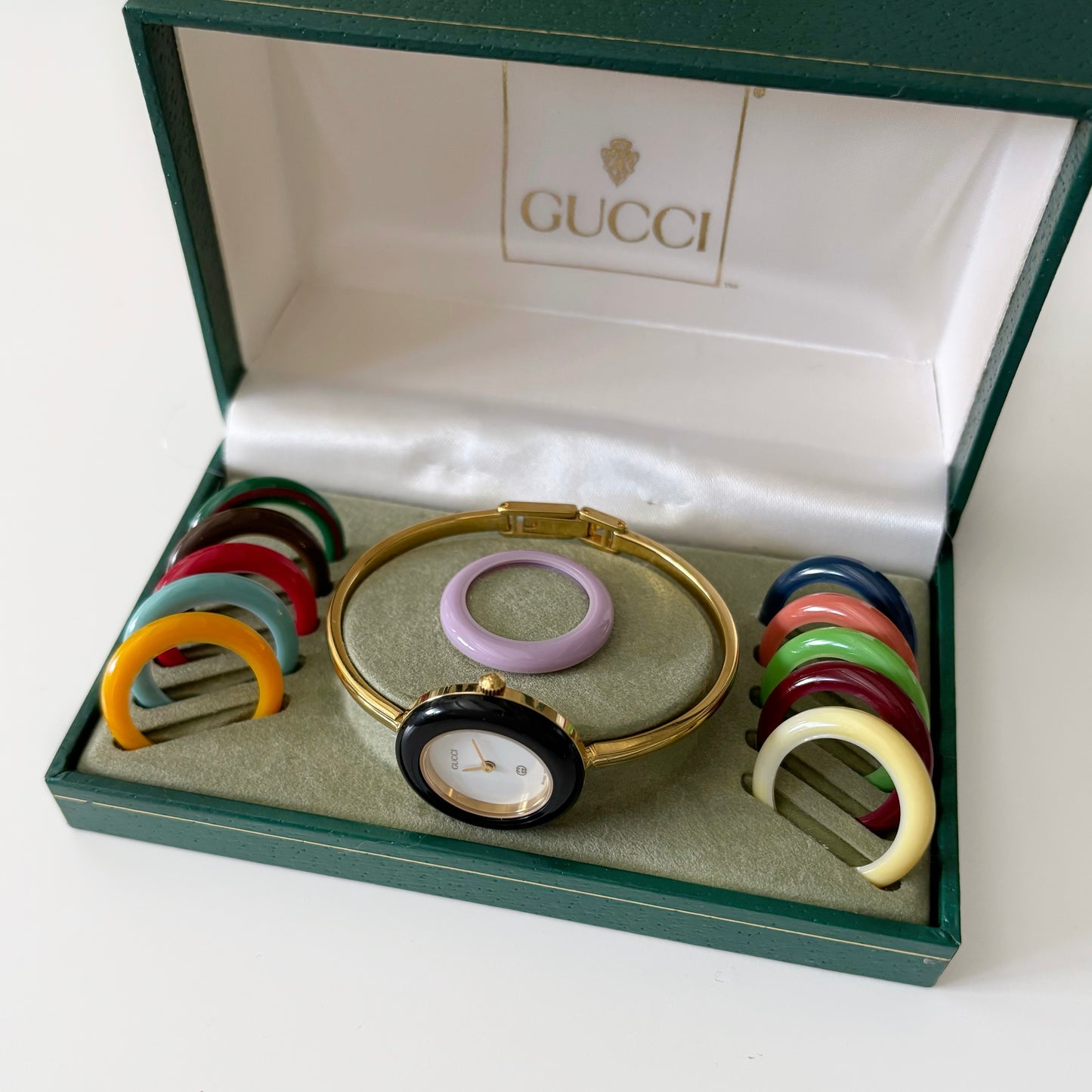 Gucci 1990s Interchangeable Bezel Gold Plated Bangle Watch with 12 bezels, case