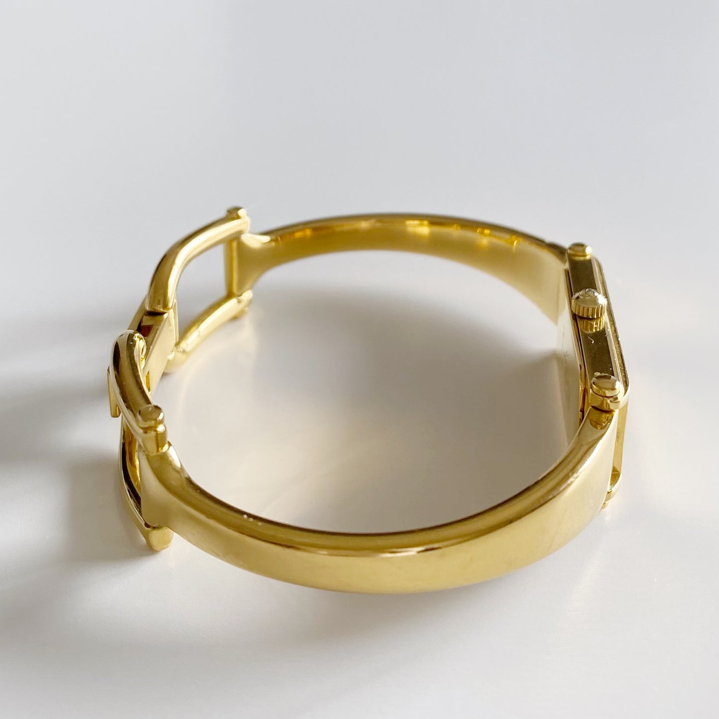 Gucci 1990s Gold Dial Rectangular  Gold Plated Bangle Watch