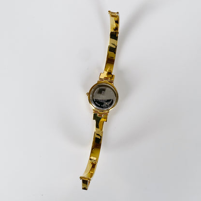 Givenchy 1990s Gold Plated Round Bangle Watch