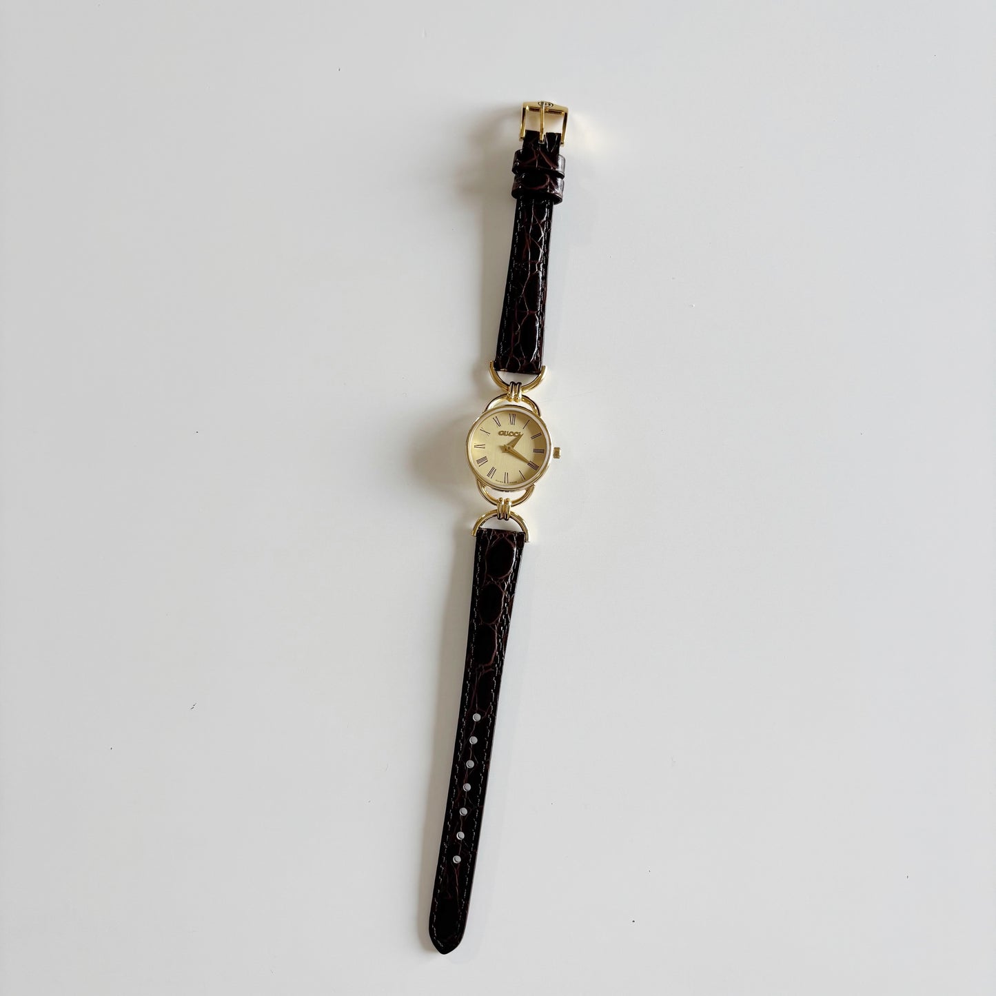 Gucci 1990s Gold Round Dial Horsebit Gold Plated Watch