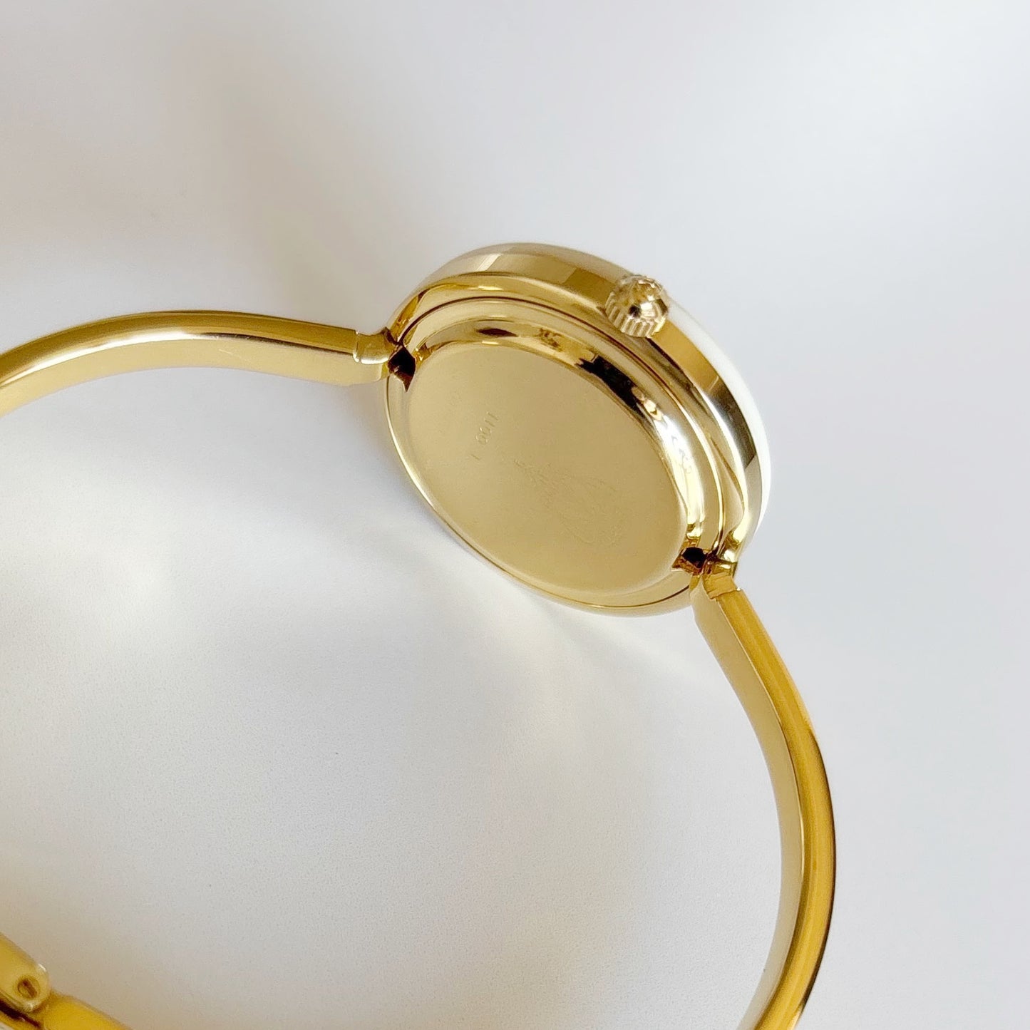 Gucci 1990s Interchangeable Bezel Gold Plated Bangle Watch with 12 bezels, case