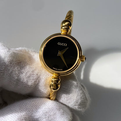 Gucci 1990s Black Dial Gold Plated Bangle Watch